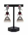 Oxidised Silver Peacock Jhumka Earrings with Red Stone & Pearl Drops